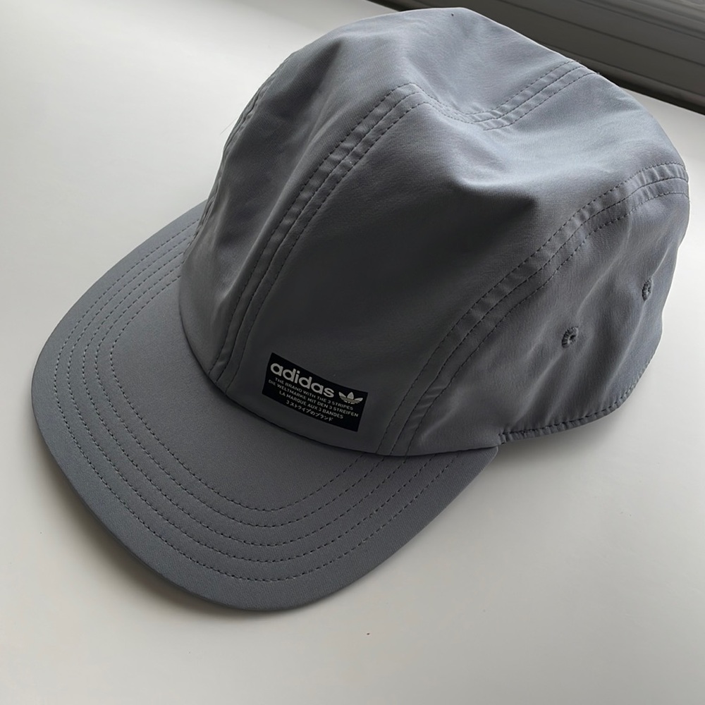 Adidas Original Grey cap/hat. The brand with three stripes. Velcro closure.